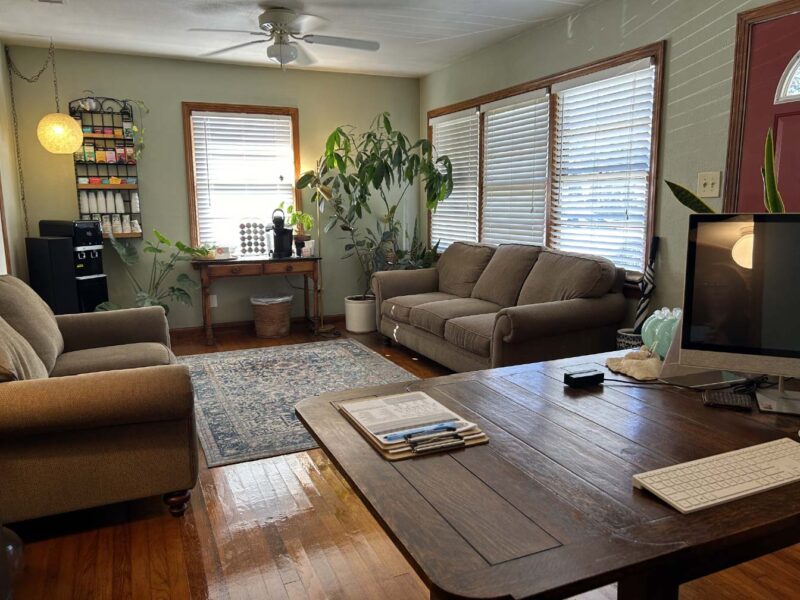 Cozy waiting room at 12th Avenue Massage Therapy Group in East Hill Pensacola, featuring a relaxing tea bar for guests to enjoy before their massage therapy session